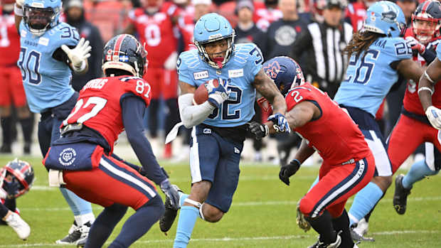 Nov 11, 2023; Toronto, Ontario, CAN; Toronto Argonauts running back Javon Leake (32) returns a kickoff against the Montreal Alouettes half at BMO Field. Mandatory Credit: Dan Hamilton-USA TODAY Sports  